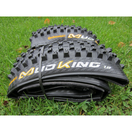 Покрышка Continental MudKing, 26"x2.30, 57-559, черная, не складная, BlackChili, Apex, Skin, 1100гр. || Покришка Continental MudKing, 26 " x2.30, 57-559, Чорна, не складна, BlackChili, Apex, Skin, 1100гр.